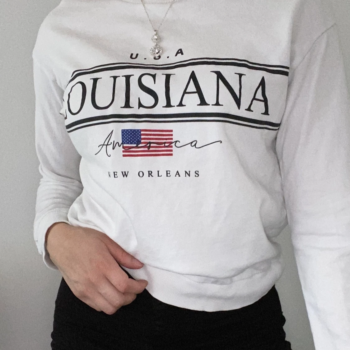 Tunnare långärmad med detaljer