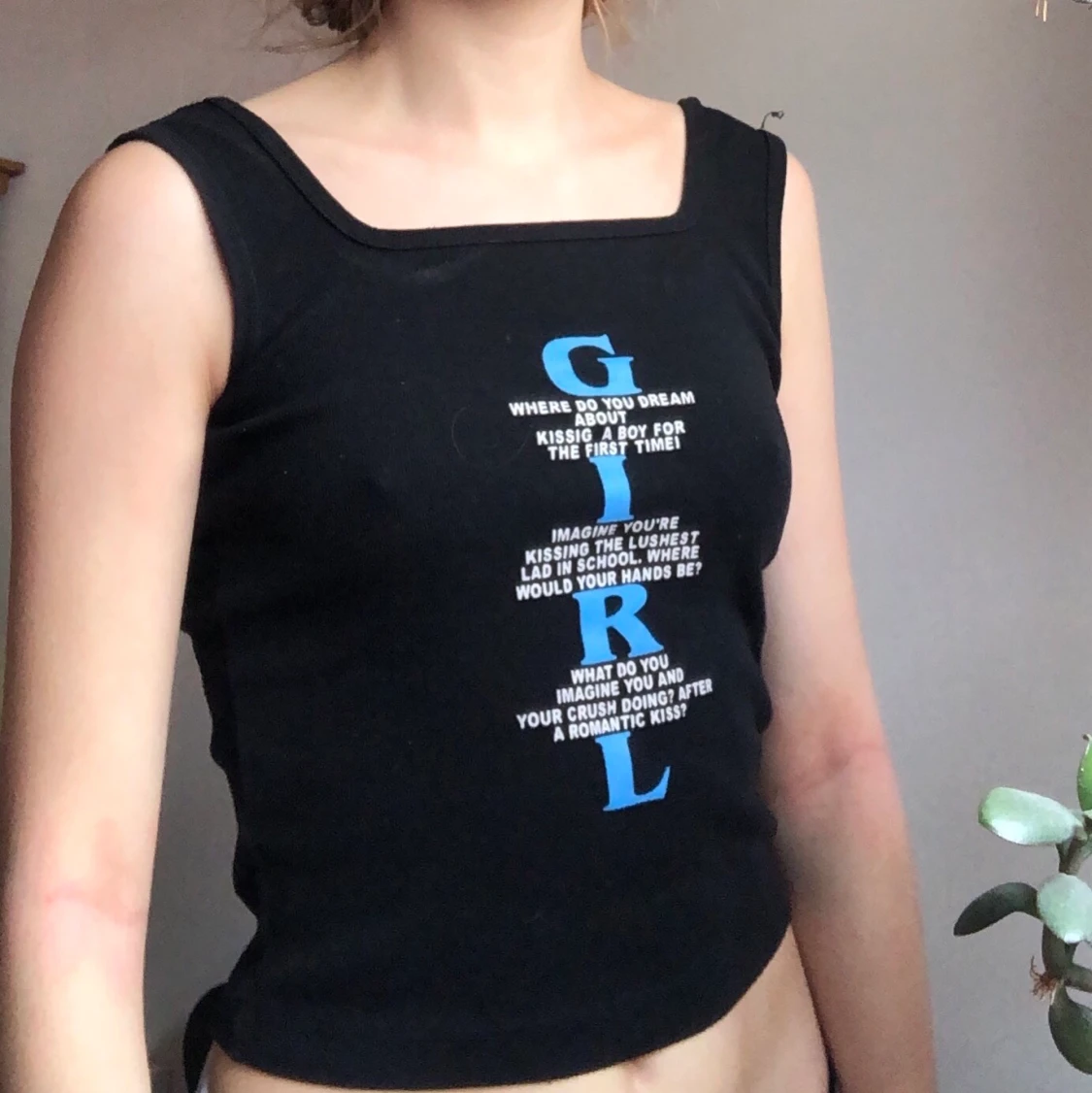 Svart linne med text-tryck