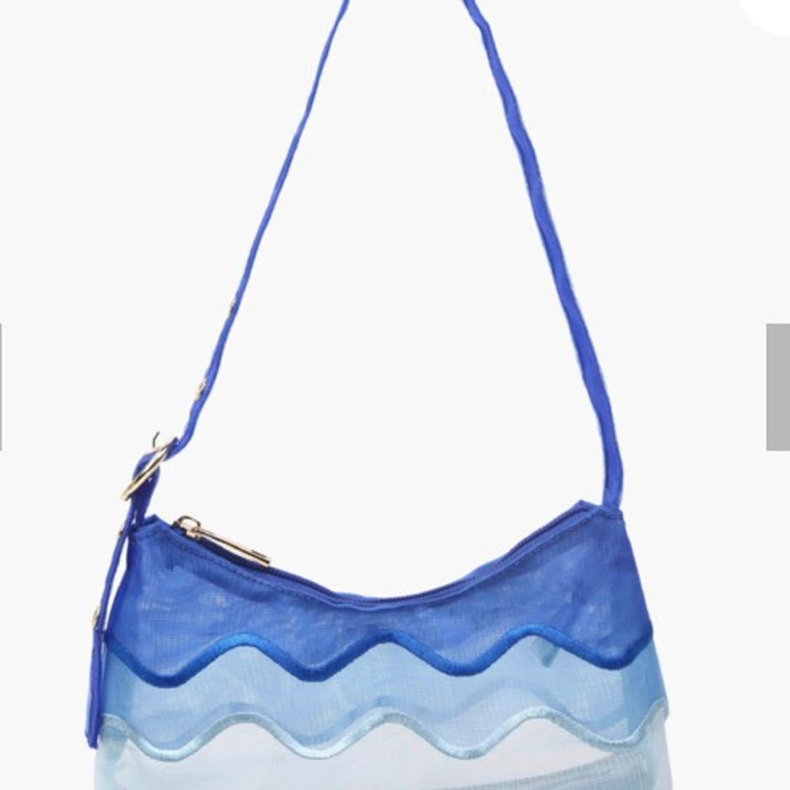 Blå transparent väska med vågigt mönster