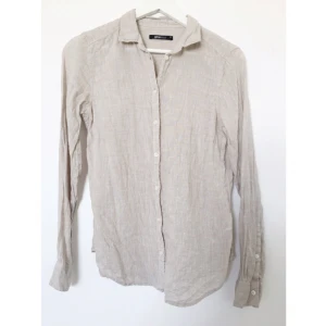  - Skjorta i 100% linne. Använd 1 gång. 