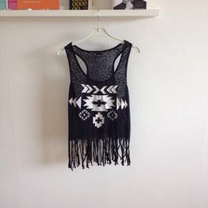 Fringed tank top from Gina Tricot