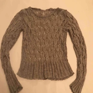  - Homemade grey wool sweeter. 