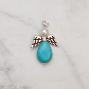  - Fin skyddsängel som passar som hänge, nyckelring mm. 45cm kedja går att köpa till för 10:-. 9:- i frakt tillkommer.