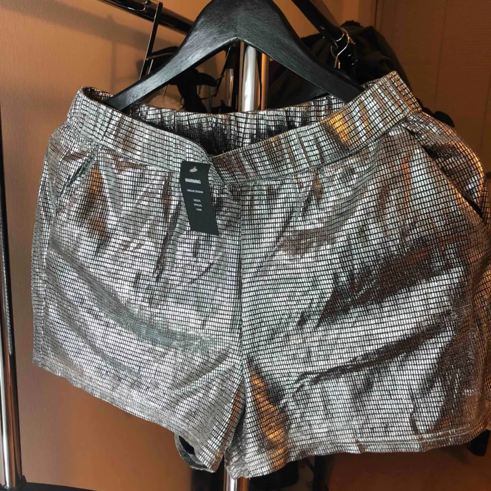 Stretchable silver shorts from Bikbok New with tag! Color: Silver . Shorts.