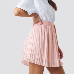 Kjol nakd - Superfin ljusrosa kjol från nakd. Helt oanvänd med lappar kvar i storlek XXS.