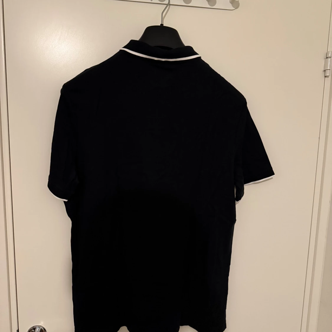 Svart piké från Calvin Klein - 1