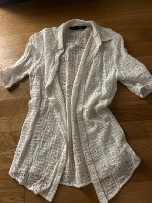 Zara Blouse - To be used on top of clothes, perfect for summer.
