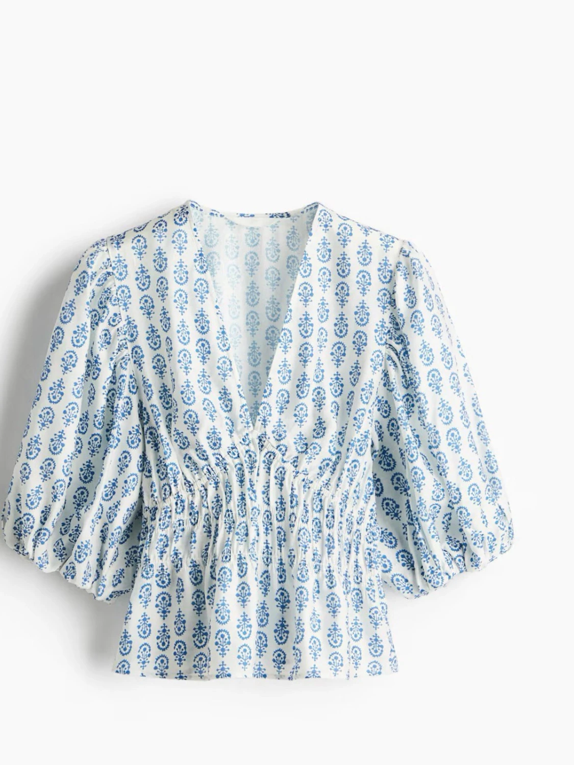 Blommig blus med puffärm