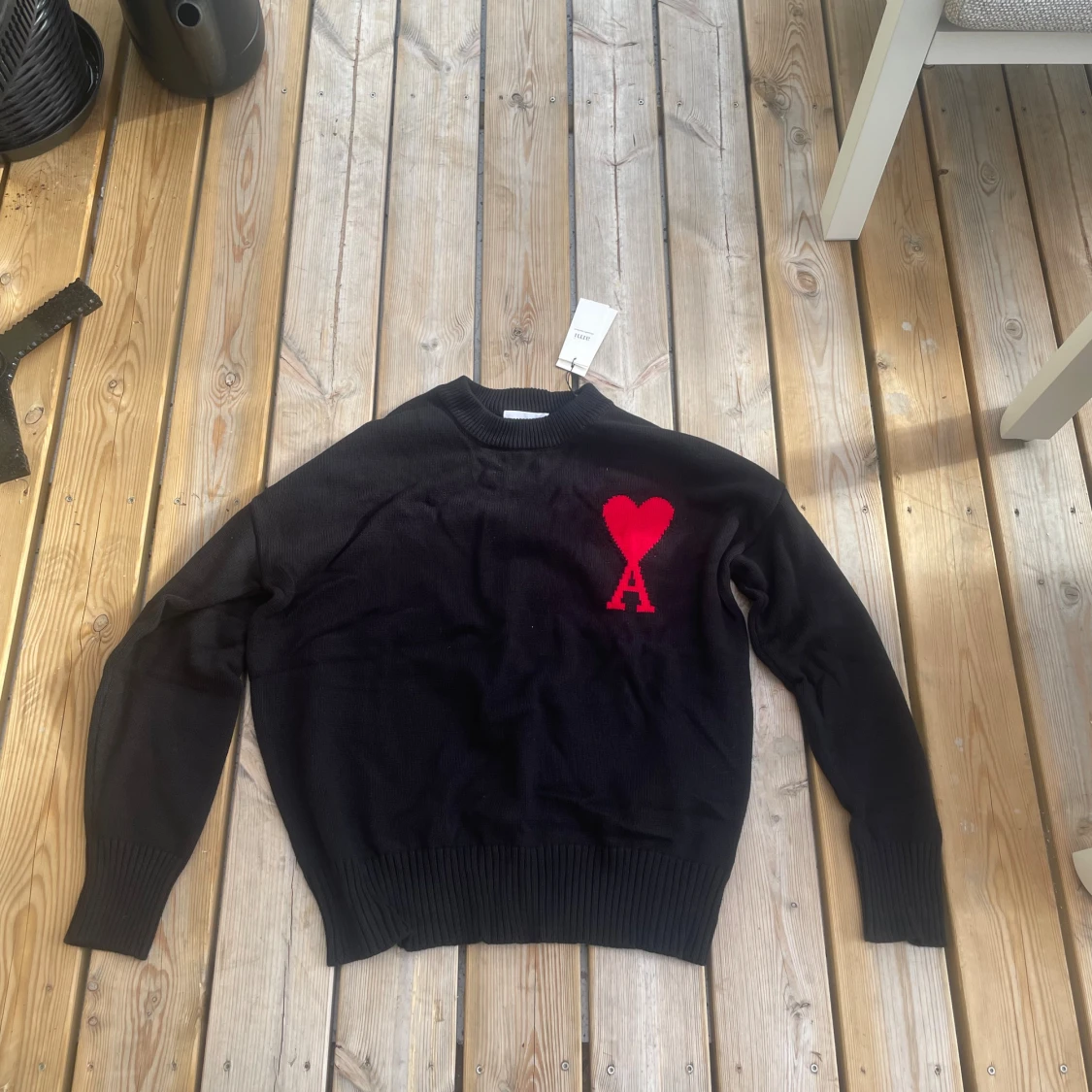 Svart stickad tröja från Ami