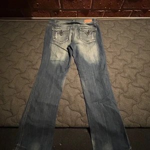 Blå flare jeans  - Inseam:80cm Waist:82cm Outer leg:106cm