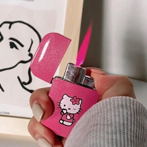 Hello Kitty tändare - Rosa glittrig hello Kitty tändare med rosa flame. Den är slut så man måste fylla på med gas