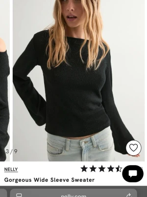 Svart tröja med vida ärmar från Nelly - En svart långärmad tröja från Nelly med vida ärmar 💕