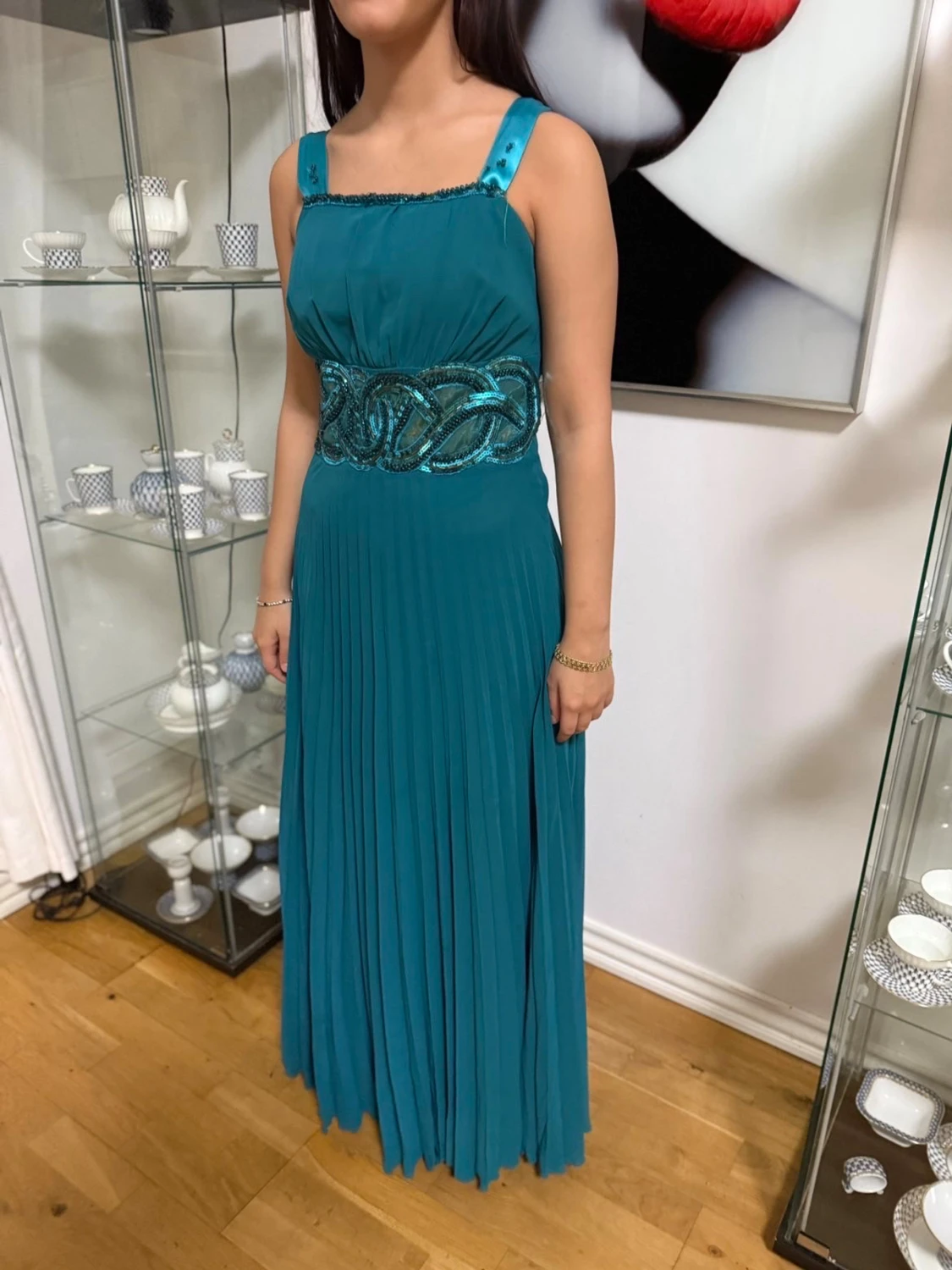 Turkos långklänning med paljettbälte