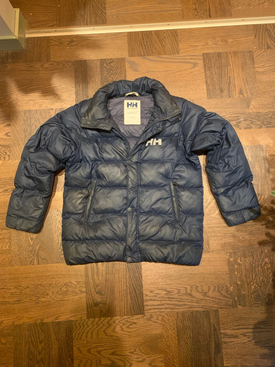 Mörkblå pufferjacka Helly Hansen