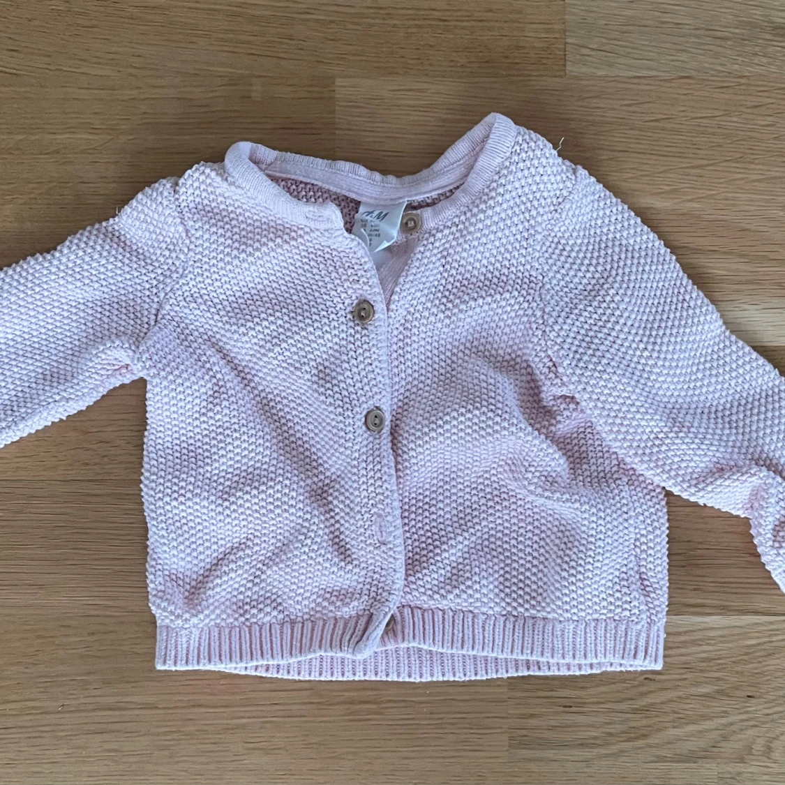Ljusrosa stickad kofta från H&M
