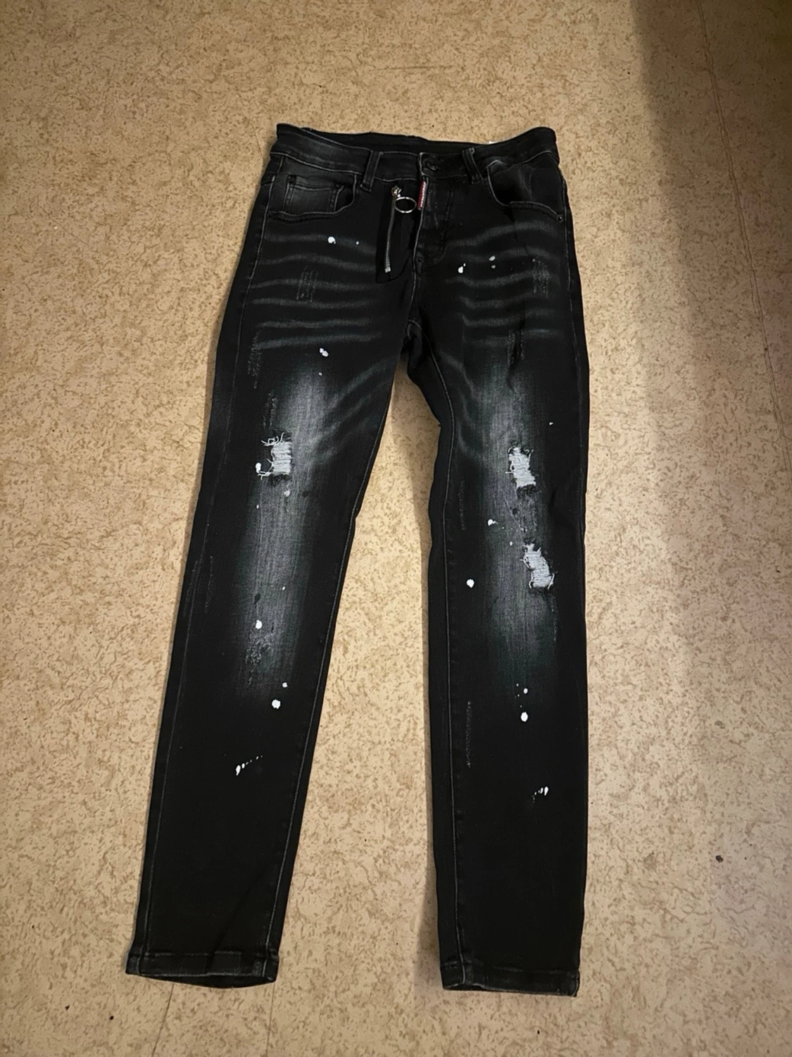 Svarta Dsquared2 jeans med slitningar
