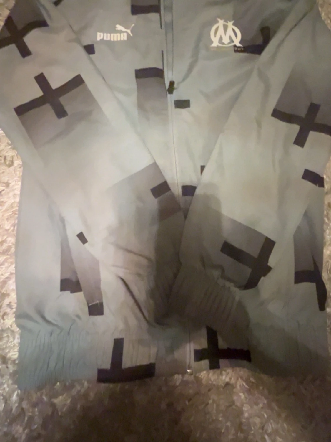 Grå vindjacka Puma x Marseille 