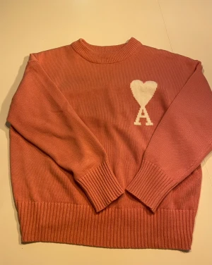 Ami Paris - Lyserød Ami Paris trøje 100%cutton/bomuld.            Str. 165-170 CM