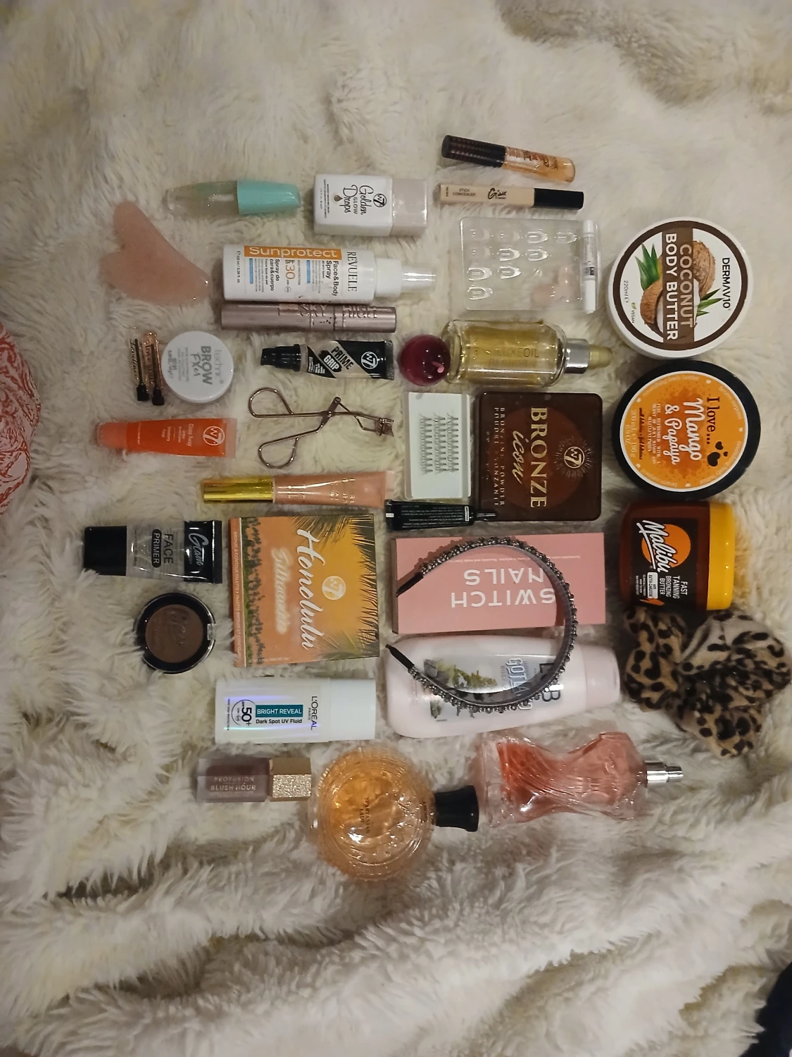 Sminkpaket med bronzer, primer och mer