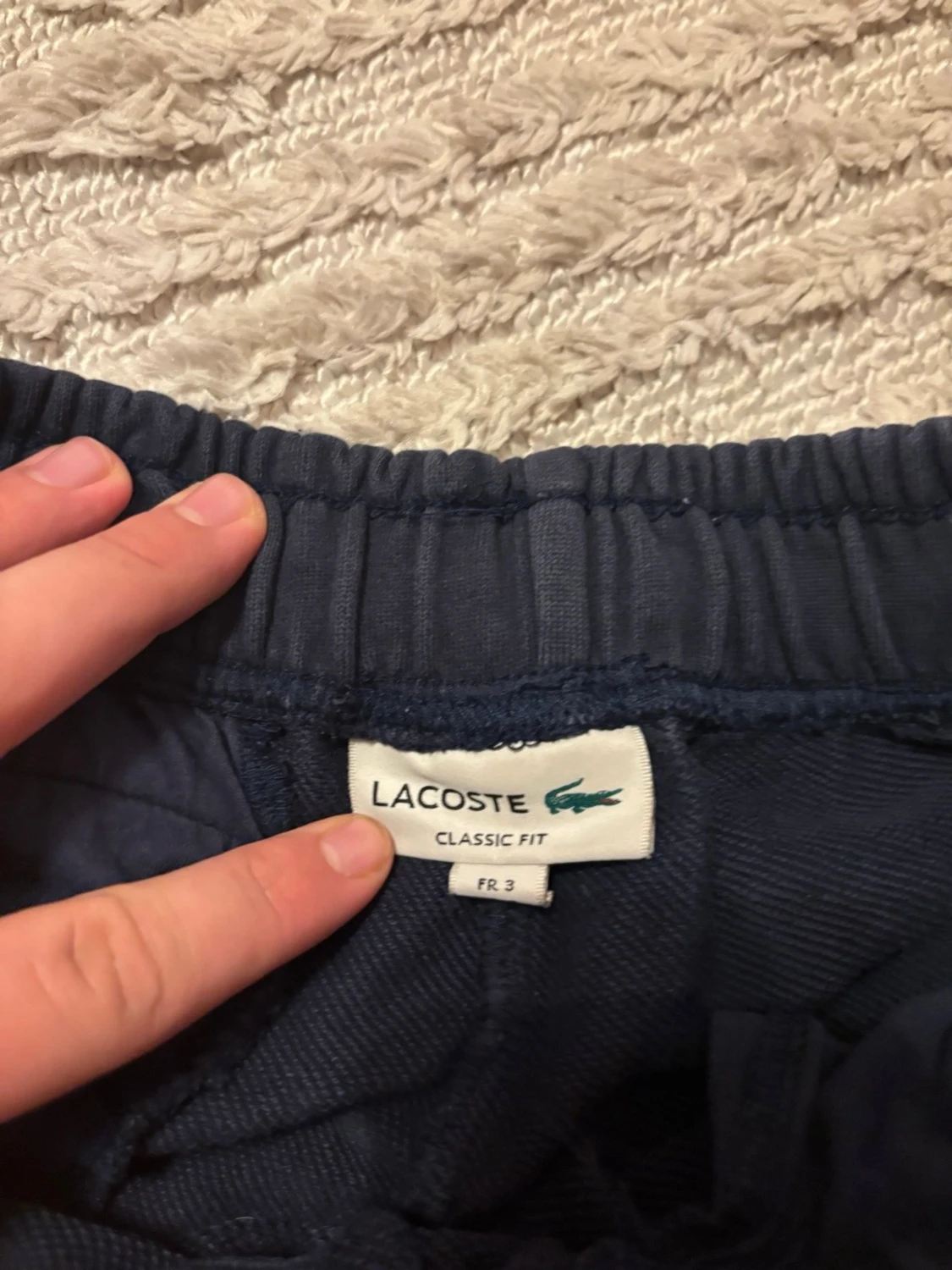 Marinblå shorts från Lacoste