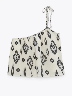 Mönstrad oneshoulder topp från Zara - Populär oneshoulder topp från Zara med unikt mönster och knytning vid bandet. Bra skick och använd fåtal gånger, skriv gärna vid fler frågor!