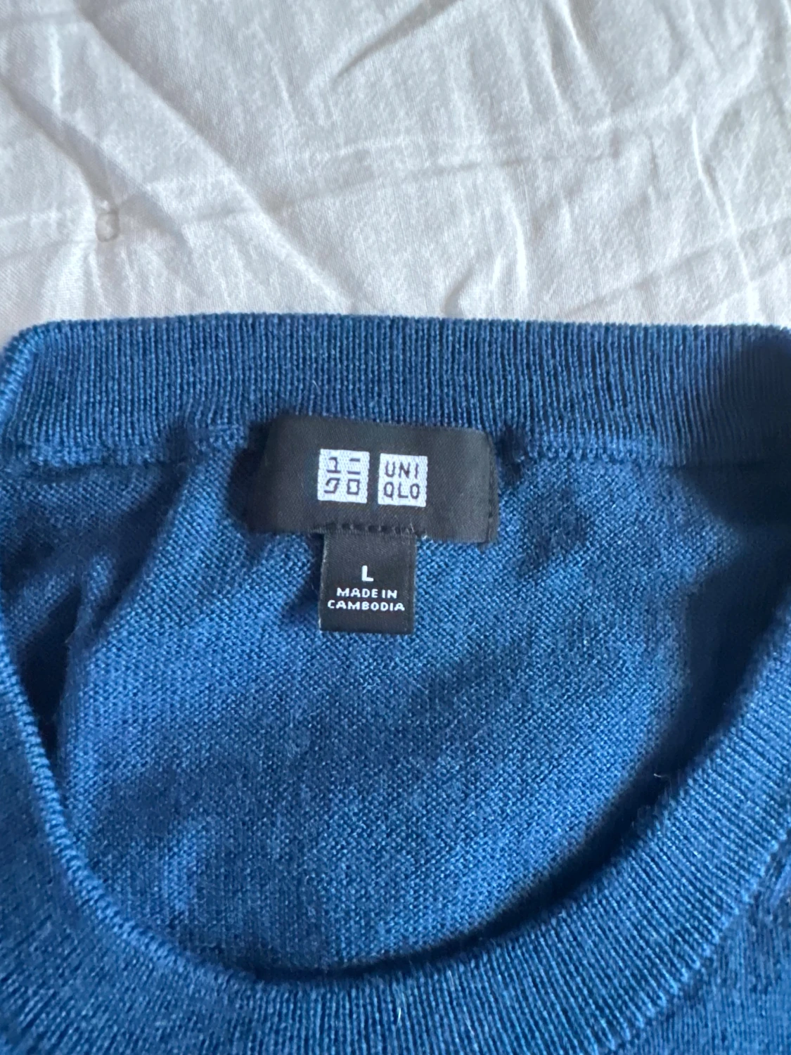 Blå stickad tröja från Uniqlo - 1
