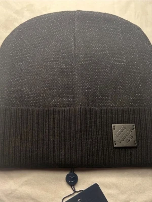 Mössa - Fin mössa, kan mötas upp i Stockholm 