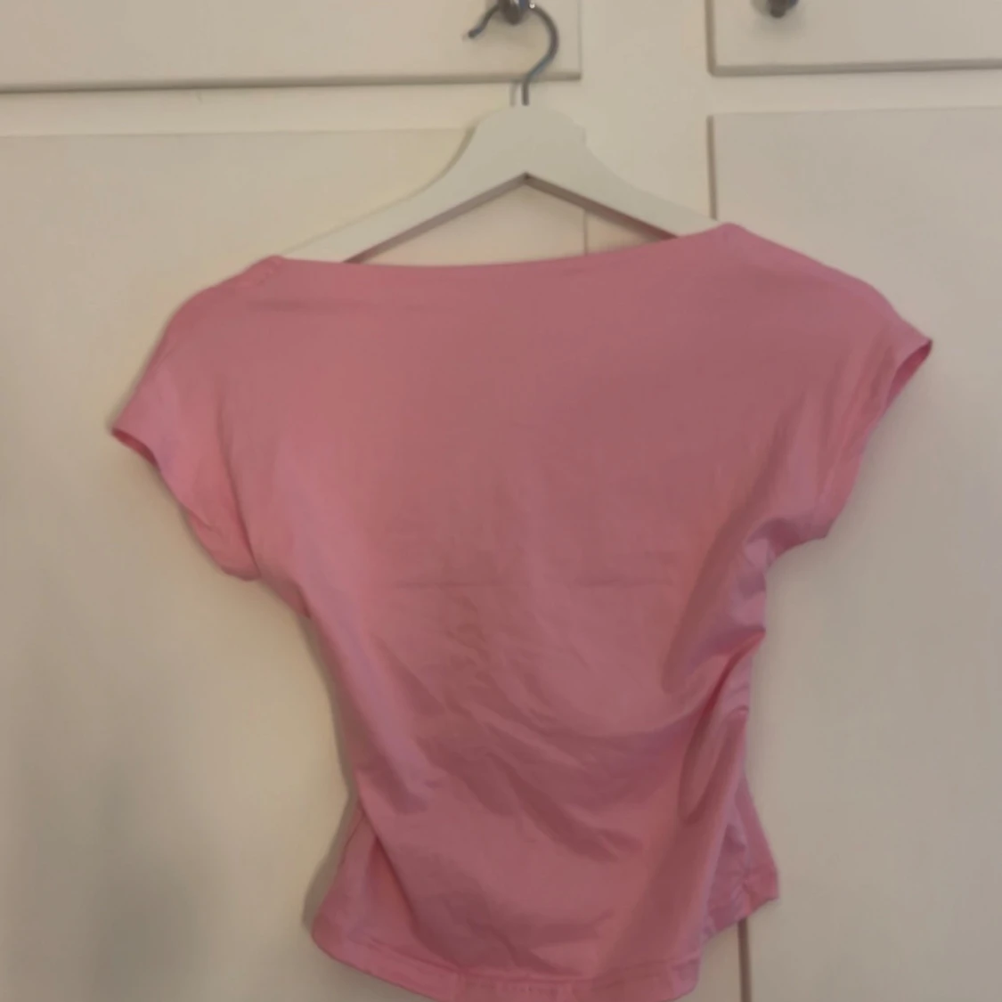 Rosa topp med öppen rygg