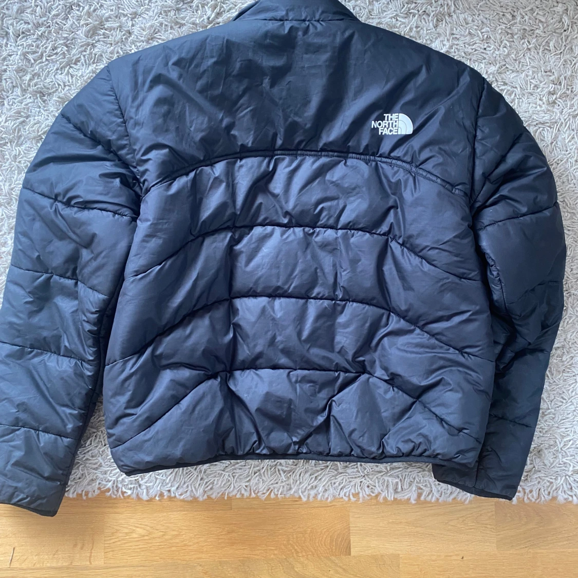 Svart pufferjacka från The North Face - 1
