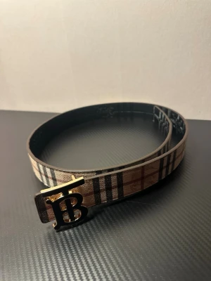 Märkesbälte med TB spänne - Säljer extra topp kvalite tb bälte, 110cm, helt ny!