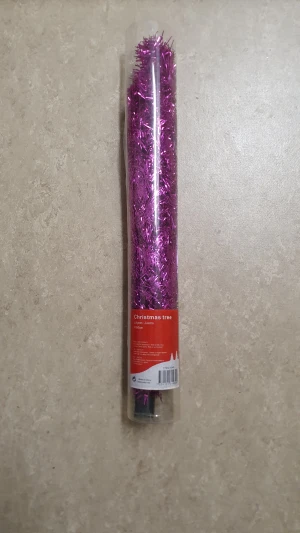 Julgran - Dekorativ julgran i lila glitter, 60 cm hög, levereras i originalförpackning. Perfekt för att skapa festlig stämning i hemmet.