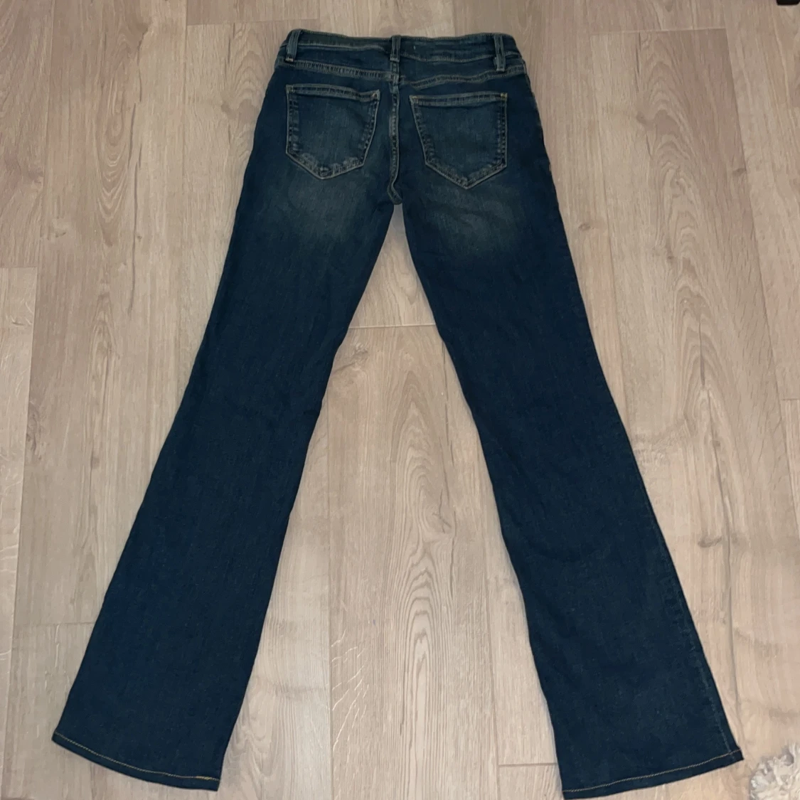 Blå bootcut jeans från MNG, stl 34 - 1