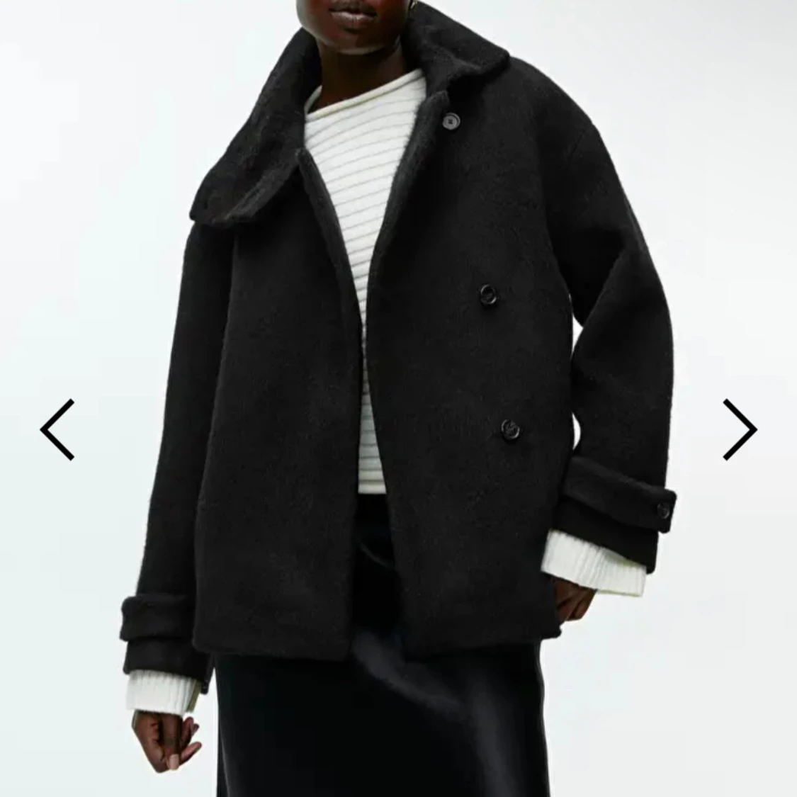 Svart kappa från arket