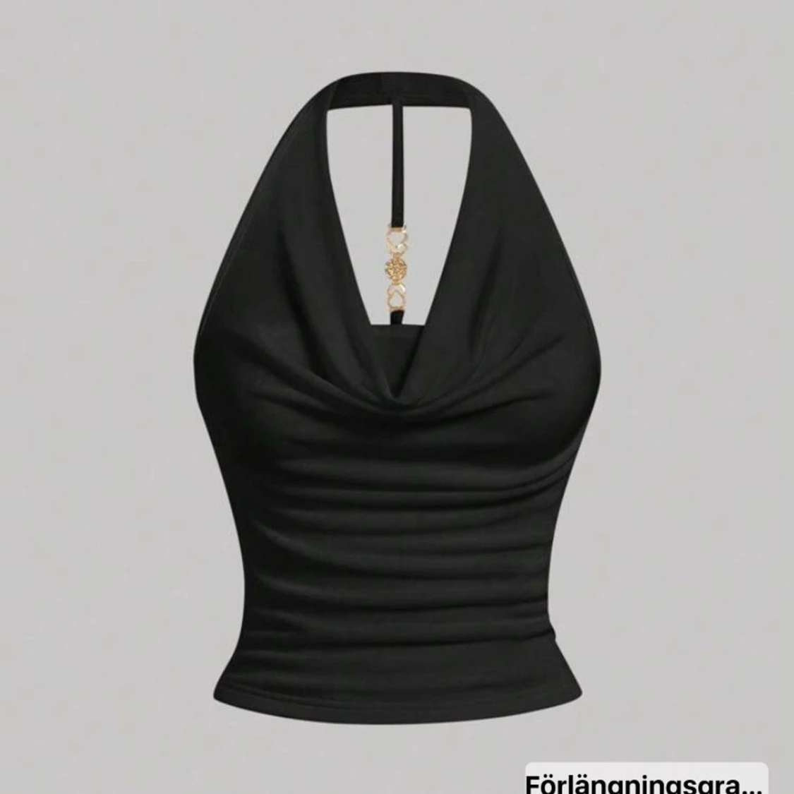 Svart halterneck topp med gulddetalj