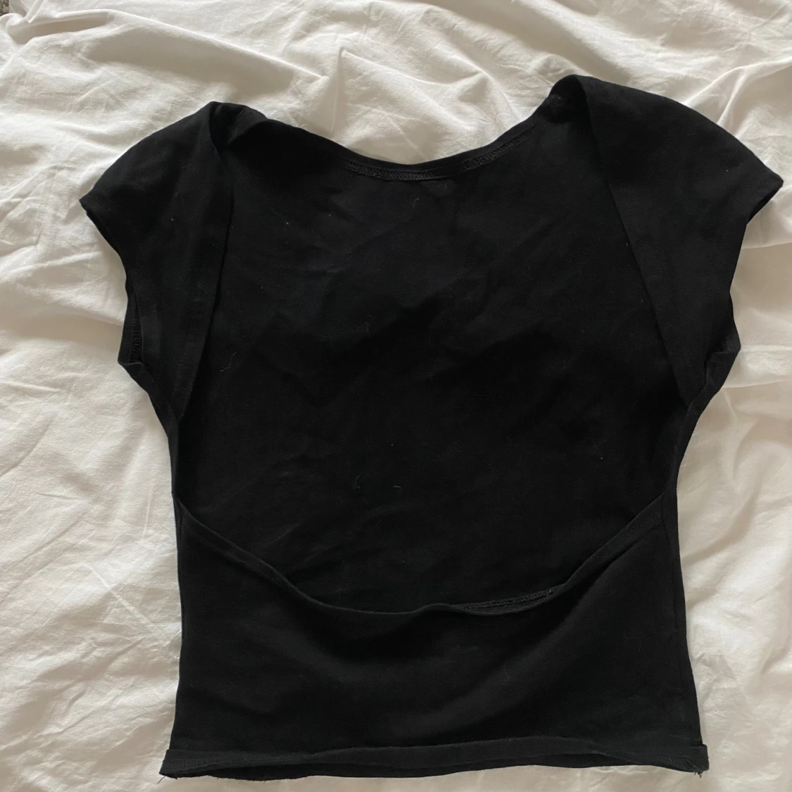Svart topp med öppen rygg - 1
