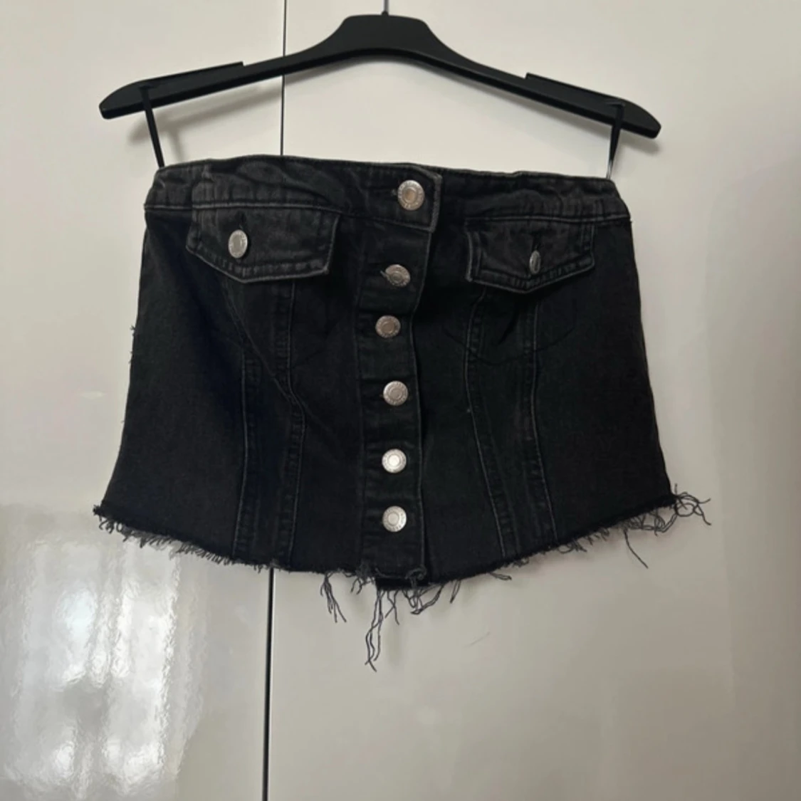 Svart jeanstopp med knappar - 1