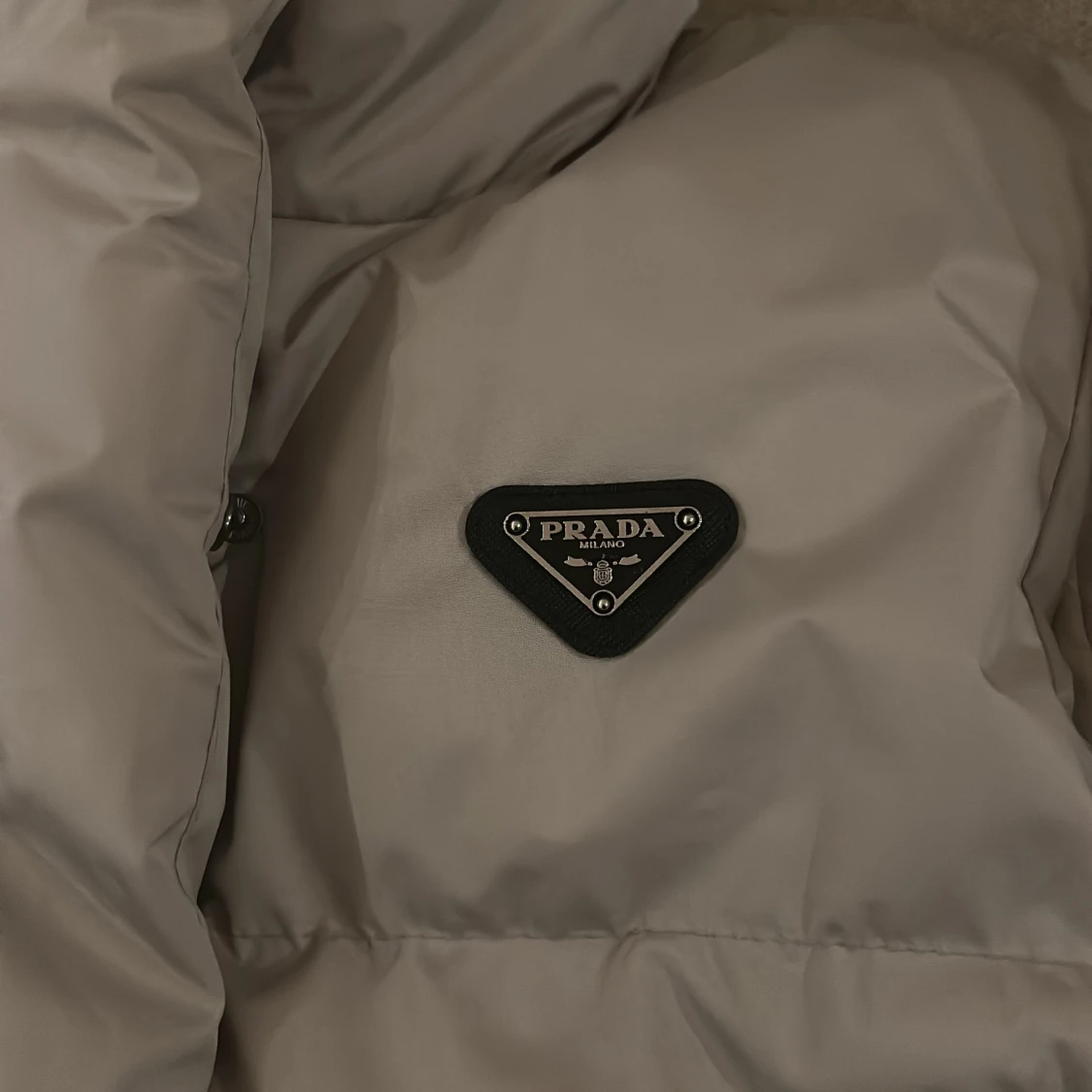 Beige dunväst från Prada - 1