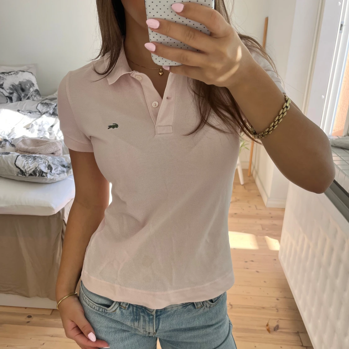 Ljusrosa piké från Lacoste - 1