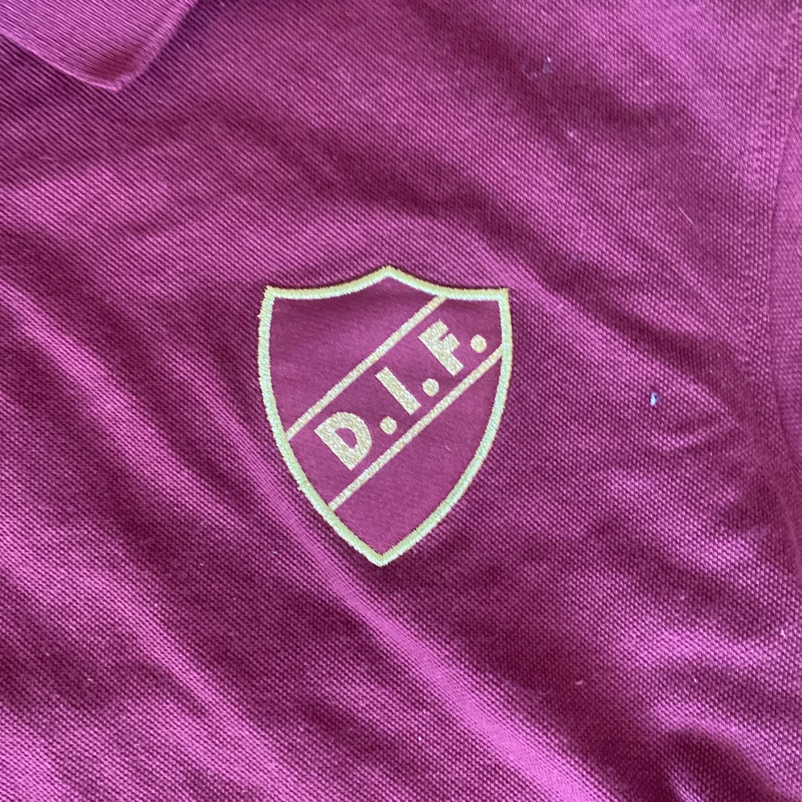 Vinröd CCM DIF pikétröja stl L - 1