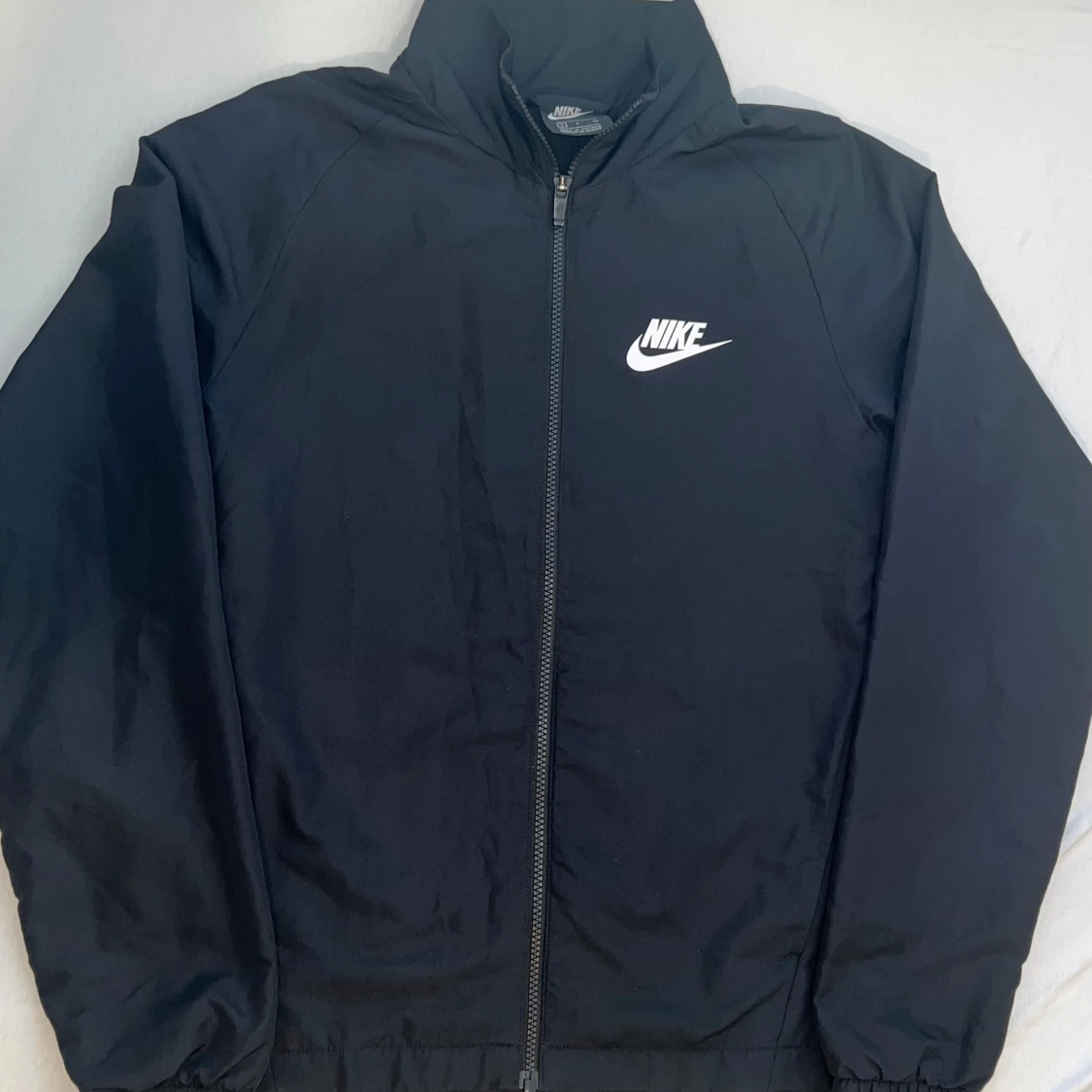 Svart vindjacka från Nike, storlek S