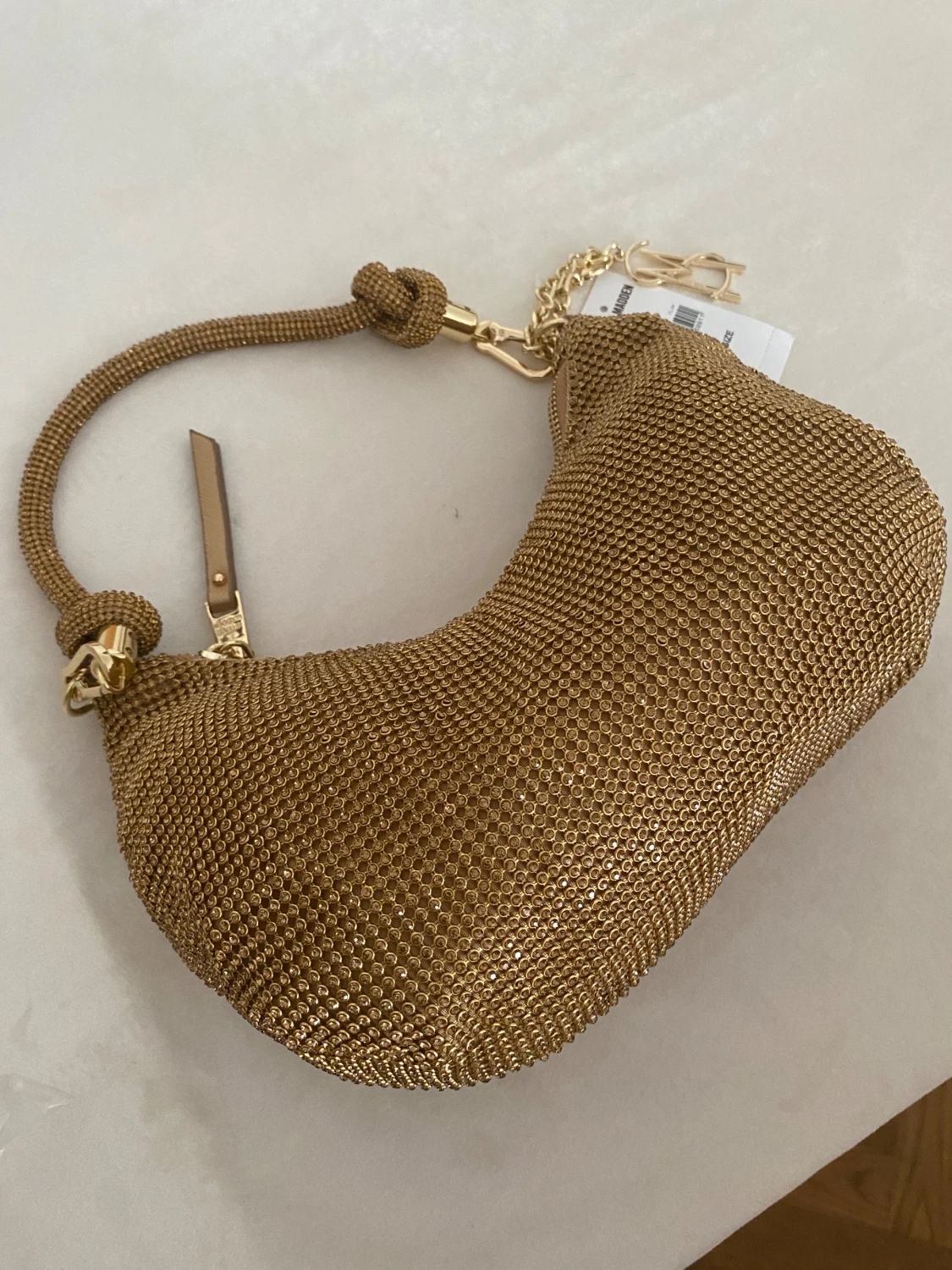 Guldig axelväska från Steve Madden