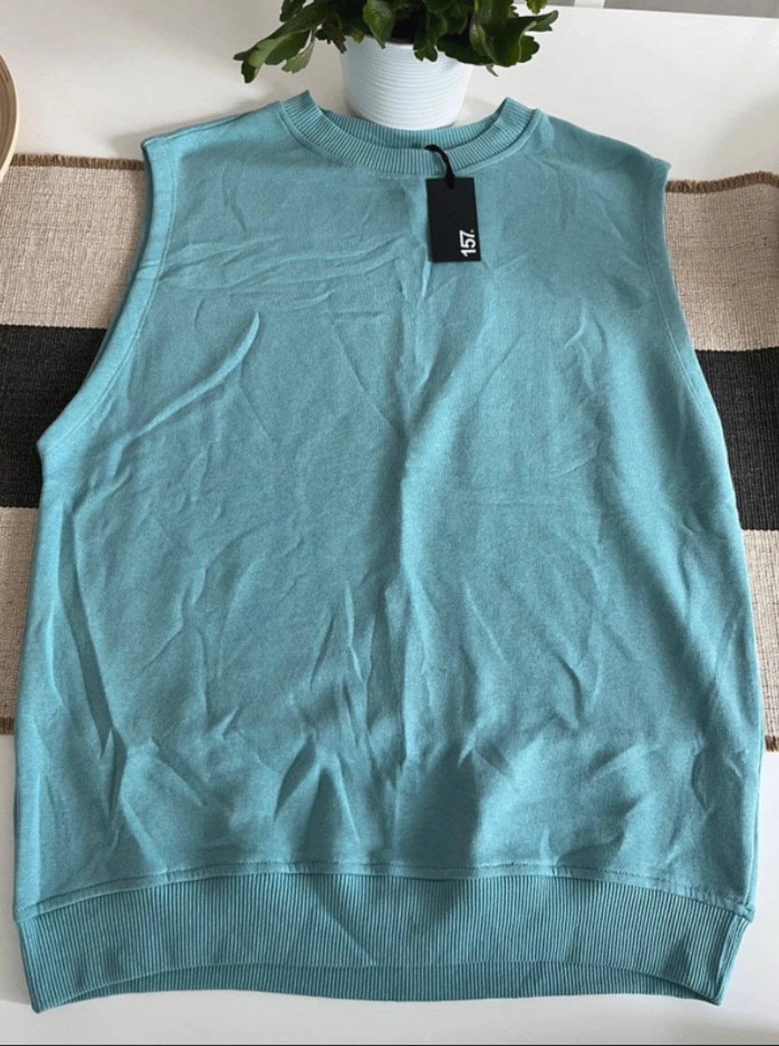 Turkos stickad väst från 157 - 2