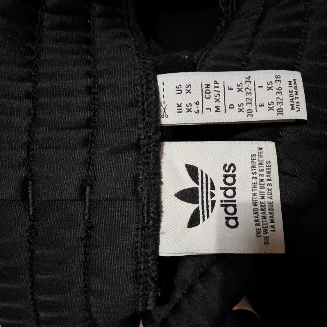 Svarta bootcut byxor från Adidas XS - 3