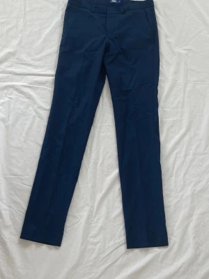 Kostymbyxor  - Mörkblå Kostymbyxor. Storlek XS.