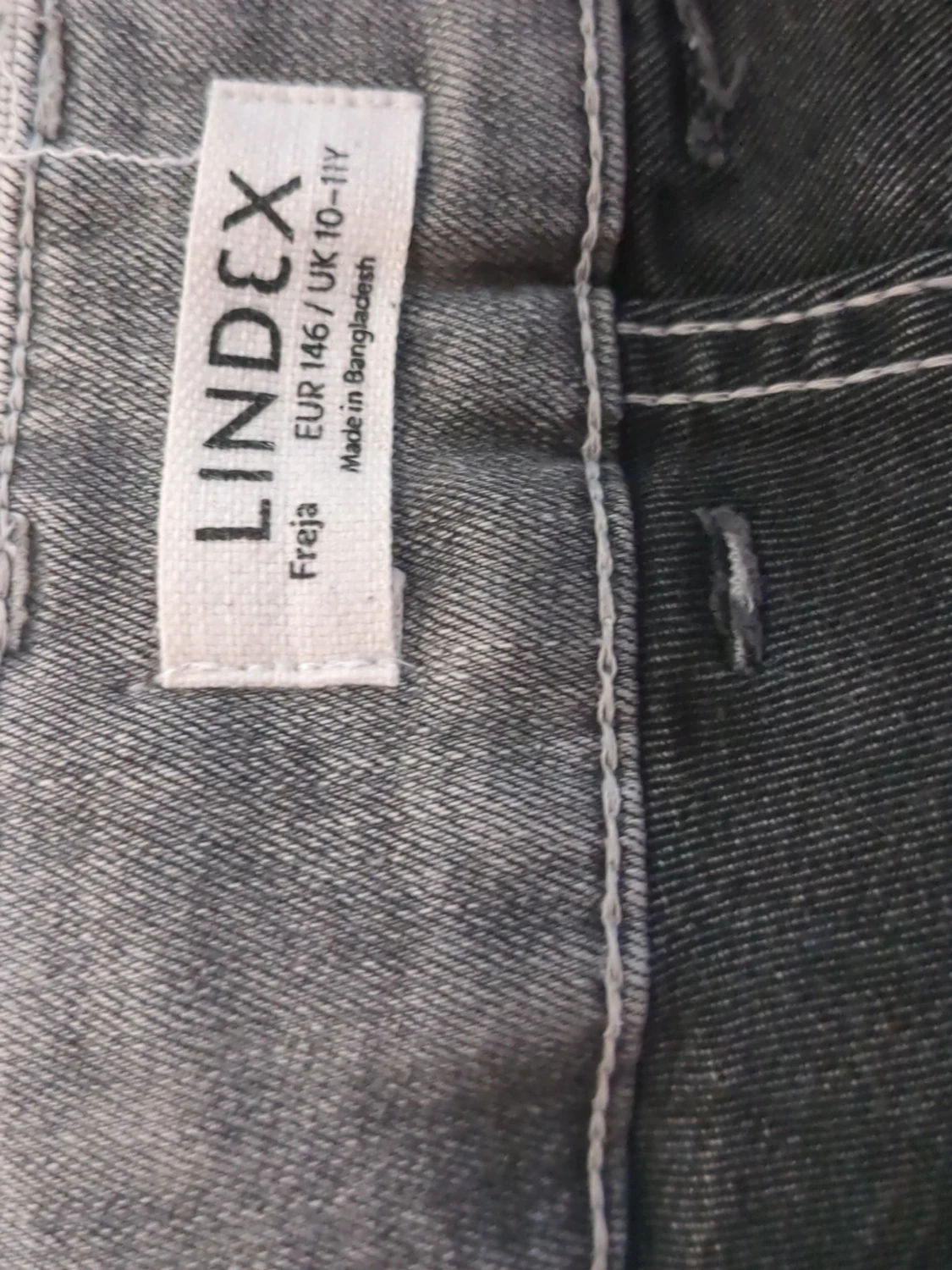 Grå jeans från Lindex i 146 - 3