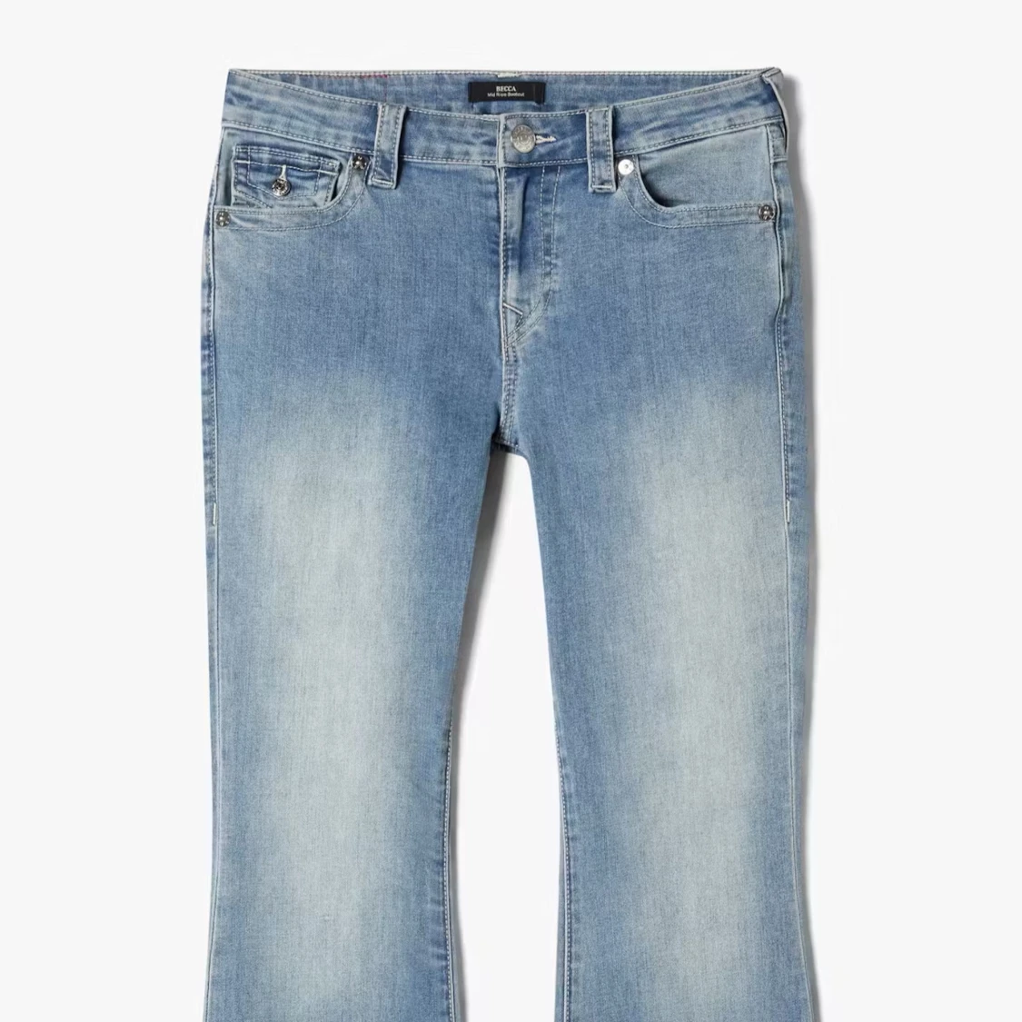 Säljer mina Ljusblå bootcut jeans från True Religion