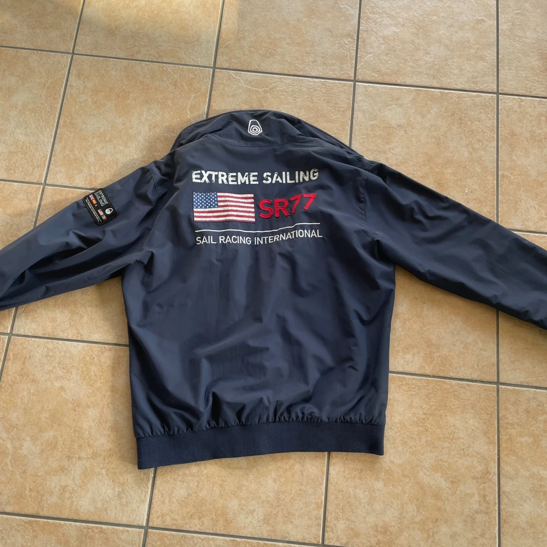 Marinblå vindjacka Sail Racing L - 1