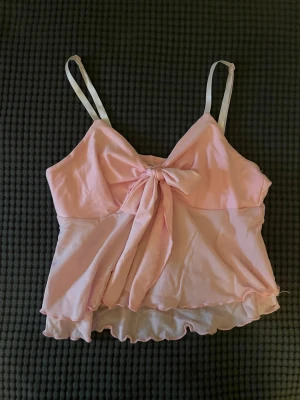 Fin rosa top med rosett  - Idk vart den e ifrån fick av en vän 