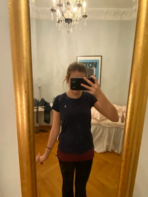 Ralph lauren - En marinblå Ralph lauren tröja med ljusrosa detalj i storlek xs