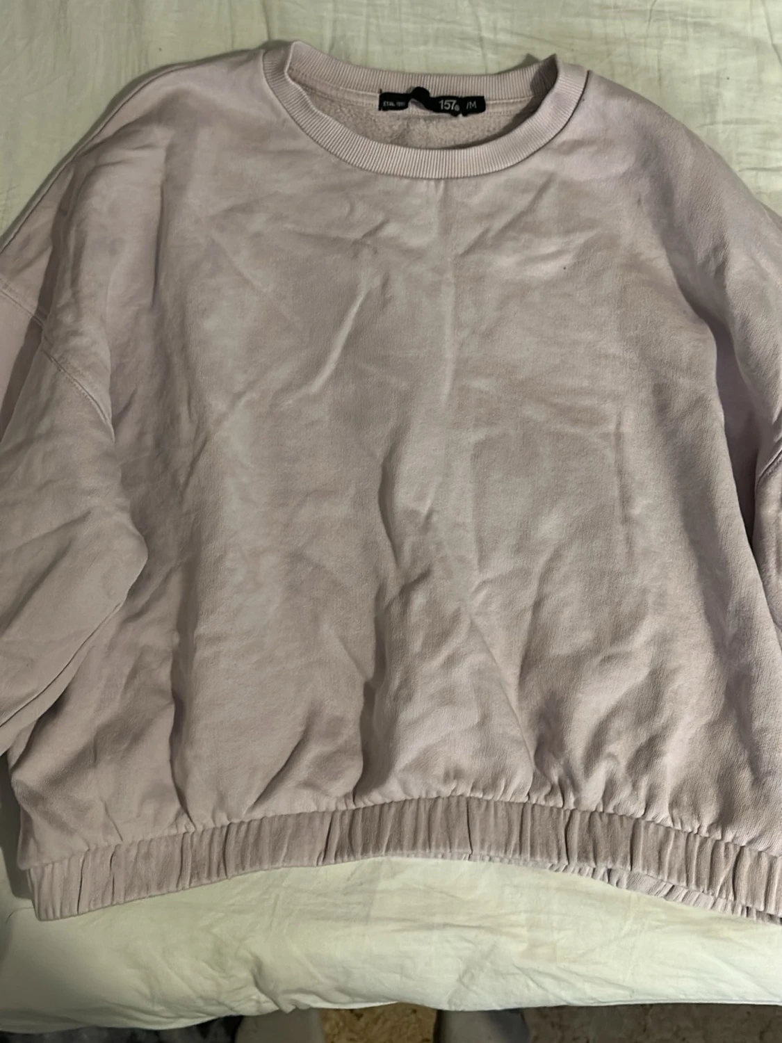 Kort tjockare tröja med resor 